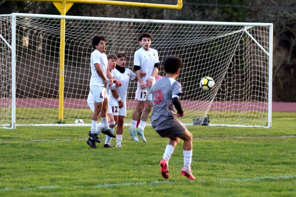 RYAN SPARKS | THE DAILY WORLD Aberdeen defenders (from left) Angel Espinosa, Ryker Scott, Ricky Granados and Trino Villar form a wall against a free-kick attempt by Hoquiams Santiago Martinez Ortiz during the Bobcats 3-1 win on Thursday in Hoquiam.