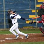 RYAN SPARKS / THE DAILY WORLD Hoquiam shortstop Bubba Jones (1) smacks a base hit during a 15-5 win over Hoquiam on Tuesday at Pioneer Park in Aberdeen.