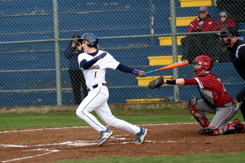 RYAN SPARKS / THE DAILY WORLD Hoquiam shortstop Bubba Jones (1) smacks a base hit during a 15-5 win over Hoquiam on Tuesday at Pioneer Park in Aberdeen.