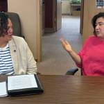Rep. Emily Randall engages with Aberdeen City Administrator Ruth Clemens.