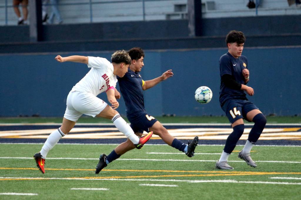RYAN SPARKS | THE DAILY WORLD Aberdeens Angel Espinosa (4) and forward Edgar Ceja (14) defend a shot by W.F. Wests Israel Lopez Cruz during the Bobcats 1-0 loss on Tuesday at Stewart Field in Aberdeen.