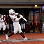 PHOTO BY HAILEY BLANCAS Montesano catcher Ali Parkin hammers a home run during the Bulldogs 8-0 win over Lynden Christian on Friday at Montesano High School.