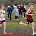 RYAN SPARKS | THE DAILY WORLD Hoquiams Ryker Maxfield (right) leads Montesanos Benny Anderson during the boys 3,200-meter race at the Ray Ryan Memorial Grays Harbor Championships on Saturday at Miller Junior High School in Aberdeen.