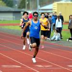 RYAN SPARKS | THE DAILY WORLD Elmas Ricardo Guadarrama crosses the line to win the 200-meter sprint at the Ray Ryan Memorial Grays Harbor Championships on Saturday at Miller Junior High School in Aberdeen.