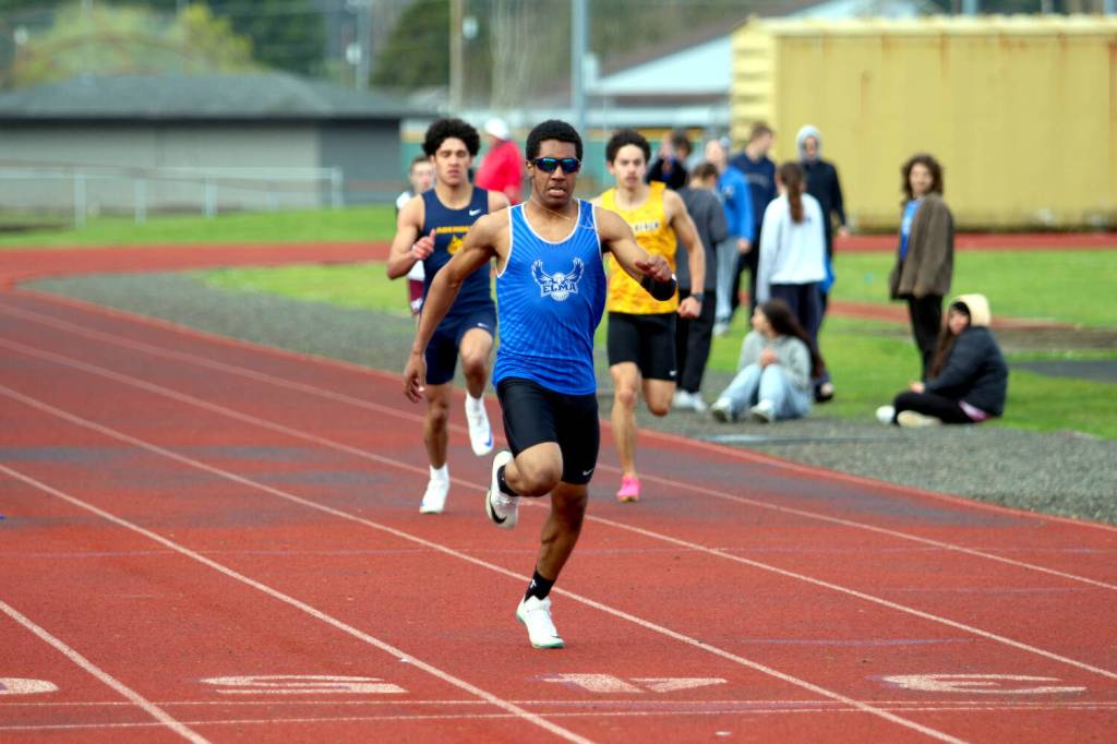 RYAN SPARKS | THE DAILY WORLD Elmas Ricardo Guadarrama crosses the line to win the 200-meter sprint at the Ray Ryan Memorial Grays Harbor Championships on Saturday at Miller Junior High School in Aberdeen.