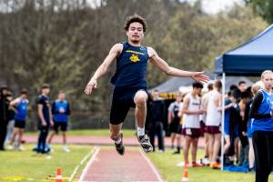 ALICIA TISDALE | ALICIATISDALE.COM Aberdeens Isaac Garcia won three events, including the triple jump (pictured), and broke two meet records at the Ray Ryan Memorial Grays Harbor Championships on Saturday at Miller Junior High School in Aberdeen.