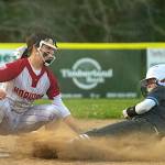 PHOTO BY FOREST WORGUM Hoquiam infielder Lexi LaBounty (left) tags out a Rochester runner during the Grizzlies 22-13 loss on Thursday at John Gable Park in Hoquiam.