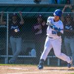 PHOTO BY FOREST WORGUM Grays Harbors Tony Dejesus belts a double during a doubleheader against Pierce College on Saturday in Hoquiam.