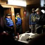 Skills & Drills workshop instructor and fisherman Robert Maw gives workshop participants a tour of a boat docked at the Port of Willapa Harbor.