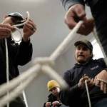 Skills & Drills workshop participants practice tying knots.