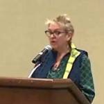 Maria Van Horn of Indivisible Ocean Shores speaks at the Ocean Shores City Council meeting.