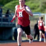 PHOTO BY FOREST WORGUM Hoquiams Oliver Bryson runs in the 4x400-meter relay at a 1A Evergreen League meet on Wednesday in Hoquiam.