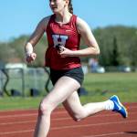 PHOTO BY FOREST WORGUM Hoquiams Katlyn Brodhead competes in a relay race during a 1A Evergreen League meet on Wednesday at Hoquiam High School.