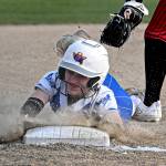 CHRYSTAL WELD PHOTOGRAPHY Elmas Ashlynn Weld slides safely into third base during a 20-1 win over Tenino on Monday in Elma.