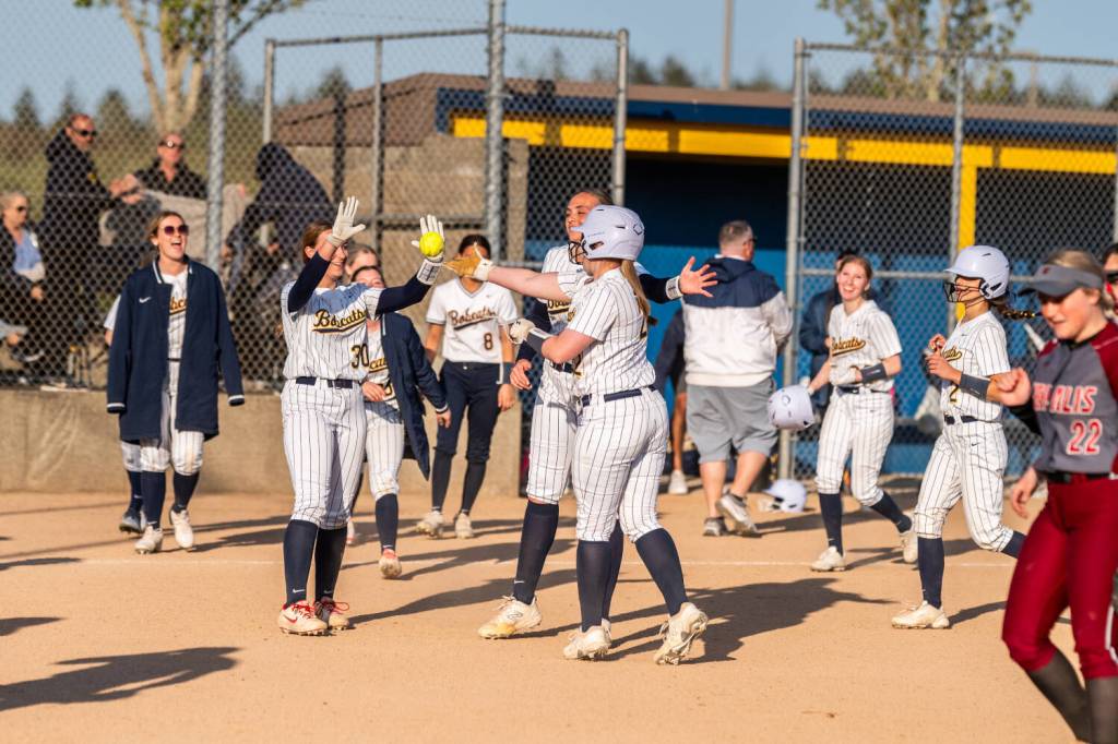 ALICIA TISDALE | ALICIA TISDALE PHOTOGRAPHY Aberdeen players celebrate a 3-2 win over W.F. West on Wednesday at the Bishop Athletic Complex in Aberdeen.