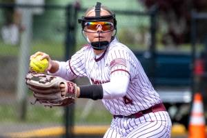 PHOTO BY FOREST WORGUM Montesano shortstop Addi Kersker throws to first during a 16-5 win over College Place on Saturday at Montesano High School.
