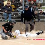 ALICIA TISDALE | ALICIA TISDALE PHOTOGRAPHY Aberdeens Scotlyn Lecomte slides in safe at home during an 11-1 win over Centralia on Monday at Stewart Field in Aberdeen.