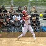 PHOTO BY FOREST WORGUM Hoquiams Hailee Burgess smacks a base hit during a 13-4 win over Tenino on Monday at John Gable Park in Hoquiam.