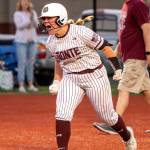 PHOTO BY FOREST WORGUM Montesano catcher Ali Park celebrates after hitting a game-winning home run in the bottom of the seventh inning in a 7-6 victory over Rochester on Thursday in Montesano.