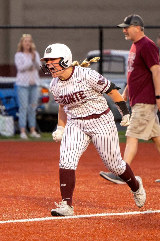 PHOTO BY FOREST WORGUM Montesano catcher Ali Park celebrates after hitting a game-winning home run in the bottom of the seventh inning in a 7-6 victory over Rochester on Thursday in Montesano.