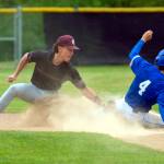 PHOTO BY FOREST WORGUM Montesanos Toren Crites (left) tags out a runner during a 7-6 victory over Bellevue Christian on Friday in Montesano.