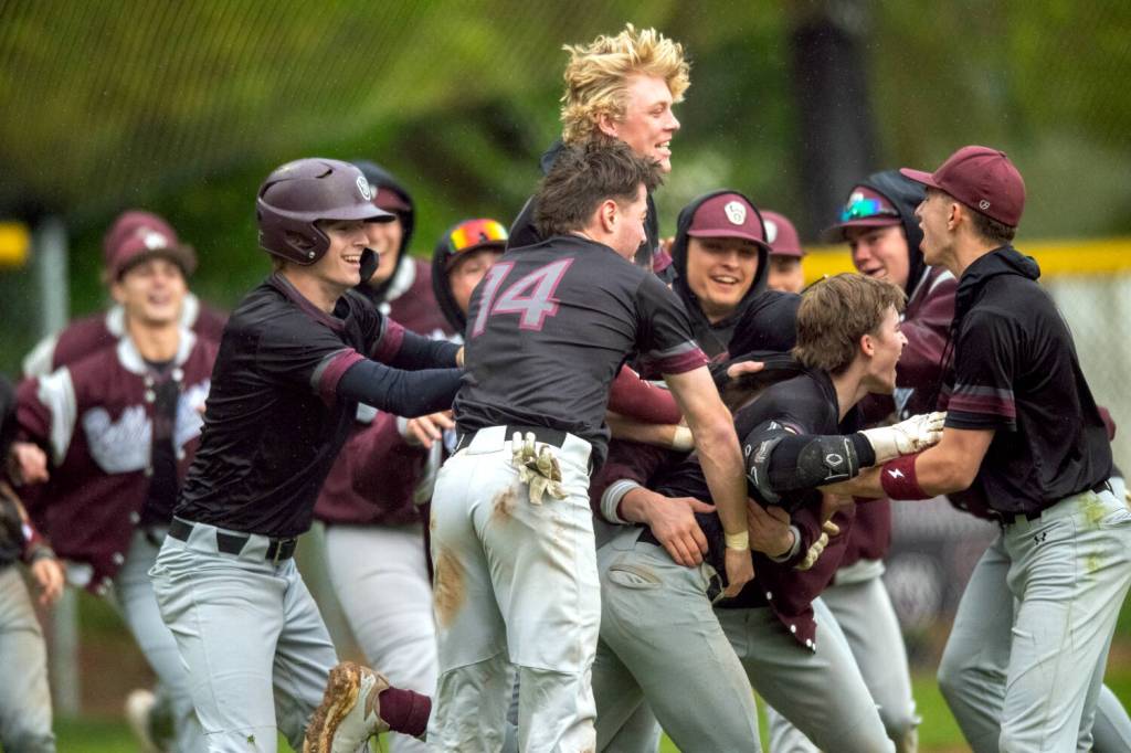 PHOTO BY FOREST WORGUM Montesano celebrates a walk-off victory over Bellevue Christian on Friday at Vessey Field in Montesano.