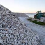 Oyster shells piled on the side of a road near a processing facility in Bay Center.