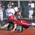 PHOTO BY FOREST WORGUM Hoquiams Lexi LaBounty slides in save at home during a 12-6 loss to Raymond-South Bend on Thursday in South Bend.