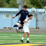 RYAN SPARKS | THE DAILY WORLD Aberdeens Edgar Ceja (14) gets his head on the ball during a 2-1 loss to R.A. Long in a 2A District 4 playoff game on Saturday at Stewart Field in Aberdeen.