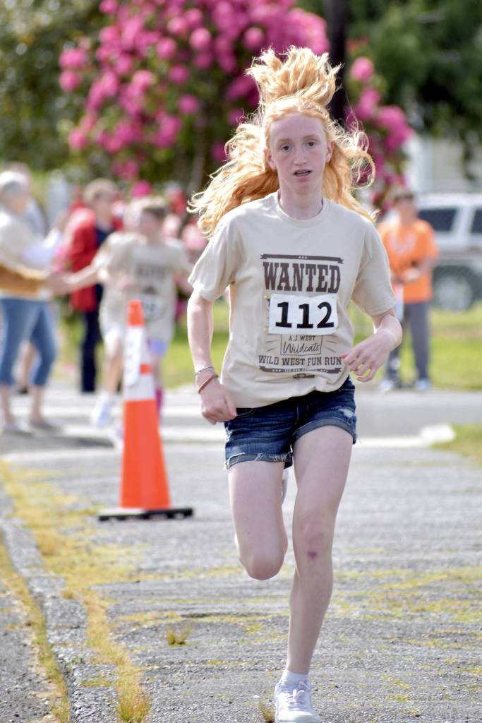 PHOTO BY RACHEAL ROSE 
A runner participates at the A.J. West Fun Run on Friday in Aberdeen.