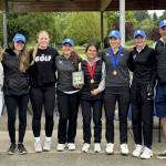 SUBMITTED PHOTO The Elma Eagles girls golf team won their third-straight district title at the 1A District 4 Championships on Tuesday in Tumwater. Pictured are (from left) Maddie Clark, head coach Alexis Keating, Amaya Lewis, Kyla Rudy, Sophia Hamilton, Olivia Moore, Mercedes Carter and assistant coach Ryan Moore.