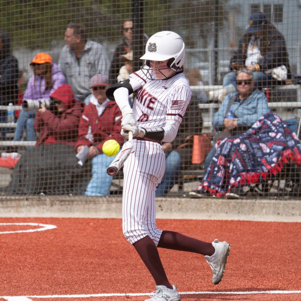 NICOLE SHANNON | THE CHRONICLE Montesanos Liv Robinson connects with a pitch during a 1A District 1/4 Tournament game on Wednesday in Centralia.