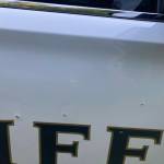 Thurston County Sheriffs Office
Bullet marks engraved on the side of a Thurston County Sheriffs Office patrol car.