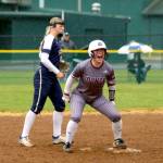 RYAN SPARKS | THE DAILY WORLD Montesanos Grace Gooding (5) lets out a cheer after hitting a double during the Bulldogs 14-6 win over Seton Catholic in the 1A District 1/4 championship game on Thursday in Centralia.