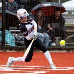 NICOLE SHANNON | MAIN FOCUS MEDIA Raymond-South Bend centerfielder Emma Glazier belts one of her two home runs in the 2B District 4 title game against Pe Ell-Willapa Valley on Thursday in Centralia.