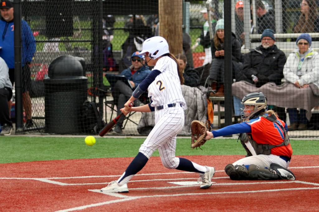 RYAN SPARKS | THE DAILY WORLD Aberdeen catcher Alyssa Yakovich (2) singles during the Bobcats 4-0 win over Ridgefield in a 2A District 4 elimination game on Friday in Chehalis.