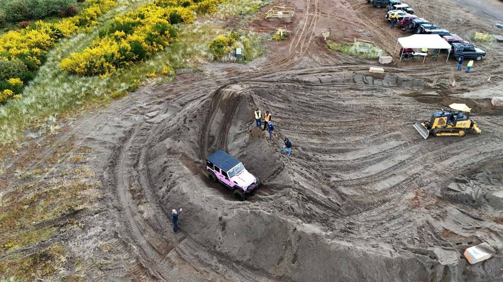 Charles CJ Ripley / For The Daily World
A Jeeper takes a spin around the Jeep playground at the Jeeps Go Topless for Clean Shores 2025 event.