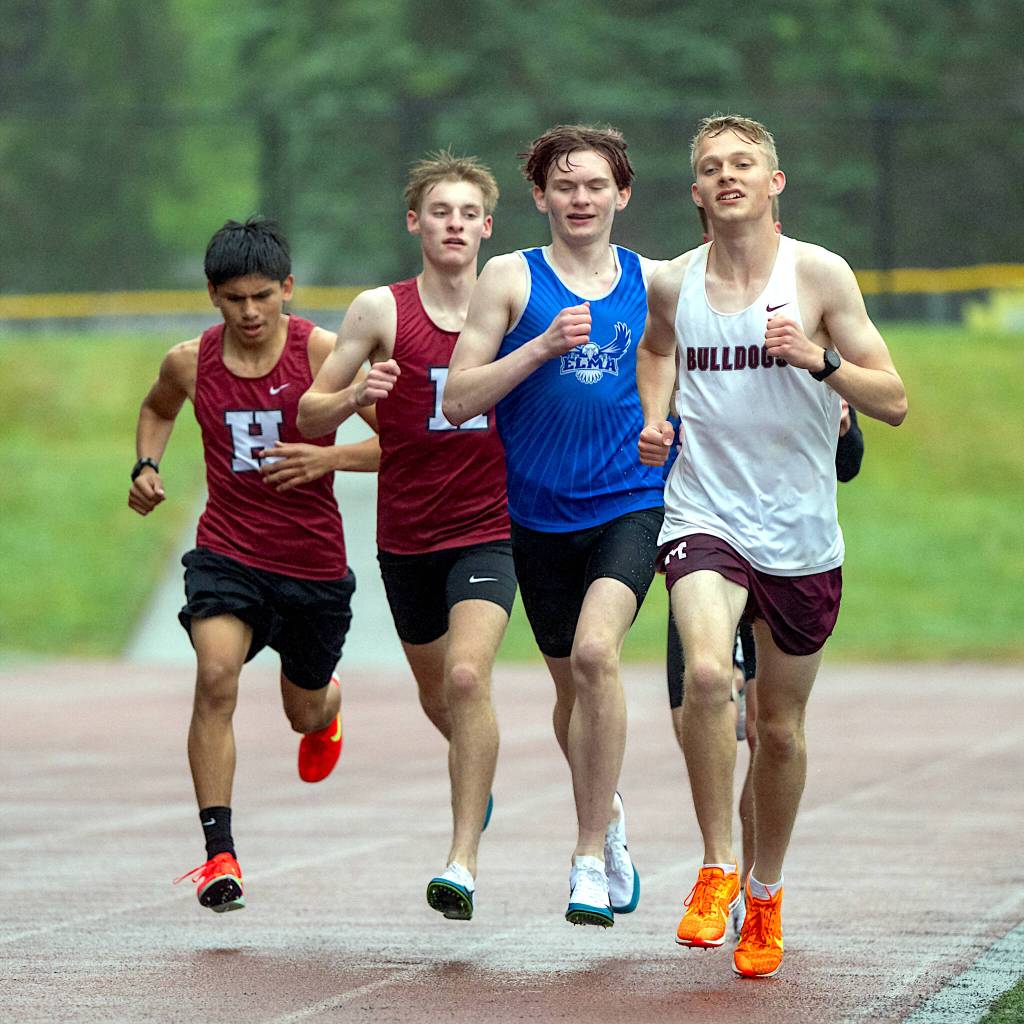 PHOTO BY FOREST WORGUM Montesanos Benny Anderson (far right) leads (from left) Hoquiams Junior Soto, Hoquiams Ryker Maxfield and Elmas Frank Roberts in the boys 3,200-meter race at the 1A Evergreen League Championships on Friday at Montesano High School.