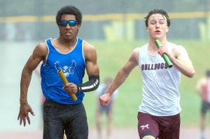 PHOTO BY FOREST WORGUM Elmas Ricardo Guadarrama (left) and Montesanos Ashton McKinney race down the final stretch of the boys 4x100-meter relay at the 1A Evergreen League Championships on Friday at Montesano High School.