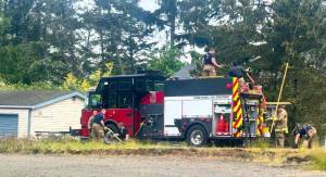 Ocean Shores Fire Department
Ocean Shores Fire Department personnel put out a fire on Mud Hen Loop on Monday.
