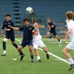 Aberdeen senior defender Angel Espinosa (second from left)