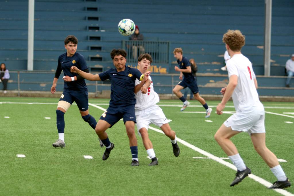 Aberdeen senior defender Angel Espinosa (second from left)