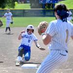 CHRYSTAL WELD PHOTOGRAPHY Elma sophomore catcher Raelynn Weld (5) slides into third during a 13-3 win over Naches Valley in the first round of the 1A State Tournament on Thursday in Richland.