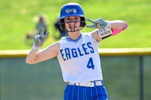 CHRYSTAL WELD PHOTOGRAPHY Elmas Kenna Monroe celebrates after collecting a base hit during a 13-3 win over Naches Valley in the first round of the 1A State Tournament on Thursday in Richland.