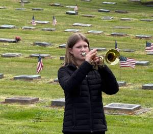 Gwendolyn Martindale
Vivienne Martindale, granddaughter of Sandra and David Bielski, played TAPS during the annual Memorial Day Service at Fern Hill Cemetery in Aberdeen on Monday. The cemetery has been in the Bielski family since 1924. David and Sandra have been hosting the service to honor our fallen veterans, since 1995.