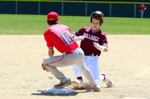 RYAN SPARKS / THE DAILY WORLD 
Montesanos Zach Timmons (right) slides into third during a win over Kings in the 1A State Tournament on Saturday at Olympic Stadium in Hoquiam.