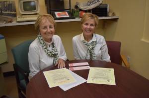 Jerry Knaak / The Daily World
Ladies Night Out organizers Bobbi McCracken (left) and Bette Worth pore over event materials in the conference room at The Daily World.