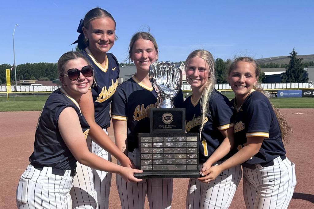 SUBMITTED PHOTO Aberdeen seniors (from left) Kadence Braaten, Lilly Camp, Abby Mainio, Zoe Vessey and Scotlyn Lecomte pose with the 2A State Championship trophy after beating Port Angeles 2-1 in the title game on May 24 in Selah.