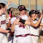 PHOTO BY HAILEY BLANCAS Montesanos Kennedy Campbell hugs Addi Kersker (4) after beating Rochester 10-5 in the 1A State Championship game on Saturday, May 24 in Richland.