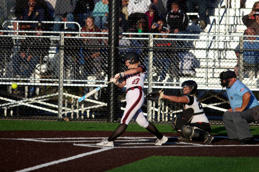 RYAN SPARKS | THE DAILY WORLD Raymond-South Bends Tressa McMullen connects with a pitch during the Senior Showcase softball game on Thursday at Centralia College.